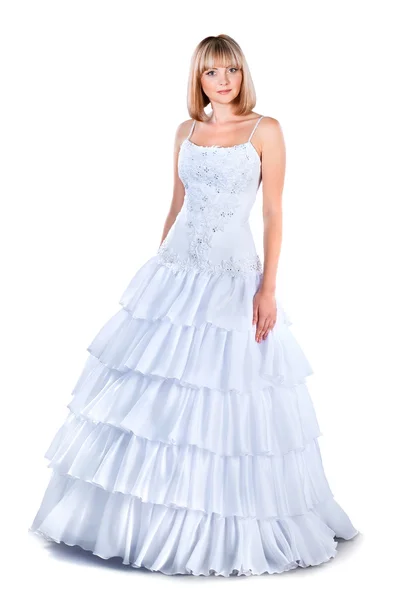 Schöne Braut trägt Brautkleid isoliert über weiß — Stockfoto