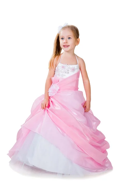 Модна маленька дівчинка в розкішній сукні ізольована на білому — стокове фото