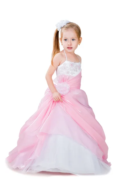 Μοντέρνα κοριτσάκι που φοράει το πανέμορφο φόρεμα που απομονώνονται σε λευκό — Φωτογραφία Αρχείου