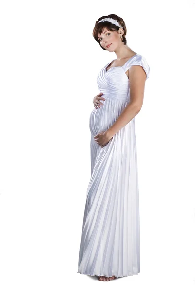 Beautiful pregnant bride wearing wedding dress isolated on white — Stock Photo, Image