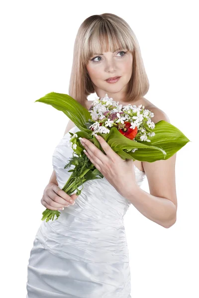 Mladá nevěsta s krásnou kytici nad bílým poz — Stock fotografie