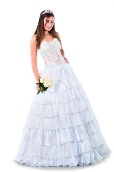 Young bride wearing ruffle wedding dress isolated over white — Stock Photo, Image
