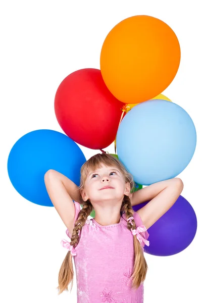 Dreaming little girl holding balloons bunch isolated on white background — Stock Photo, Image