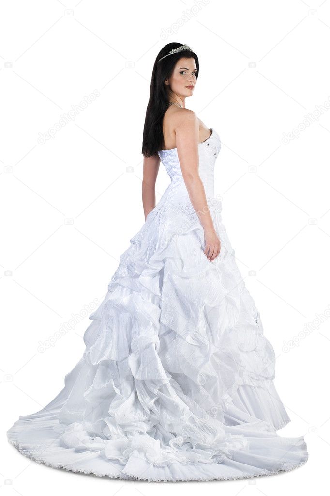 Stunning brunette bride in gown isolated on white background