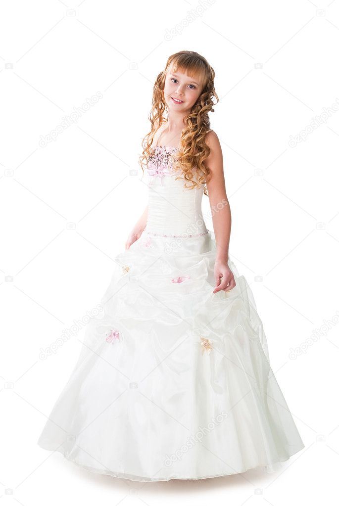 Shiny young girl wearing light gown dancing isolated over whi