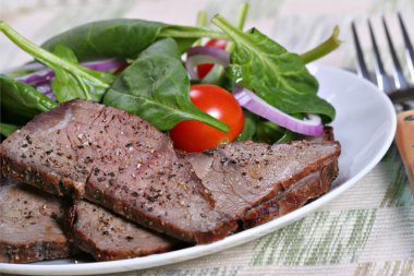 Beef sirloin and spinach clipart