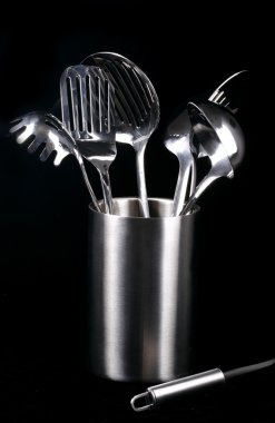 Kitchen utensiles on black clipart