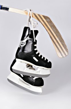 Hokey skates and stick clipart