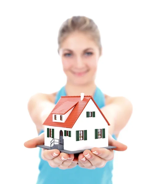Girl with house in hand — Stock Photo, Image