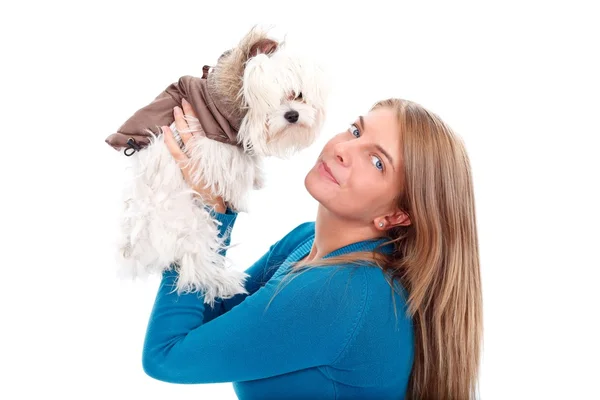 Woman holding her puppy Stock Image