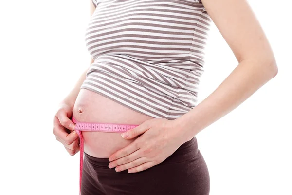 Growing pregnant belly — Stock Photo, Image