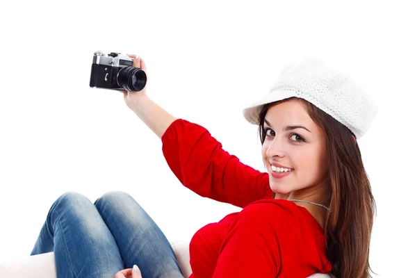 Девушка и камера старого стиля — стоковое фото