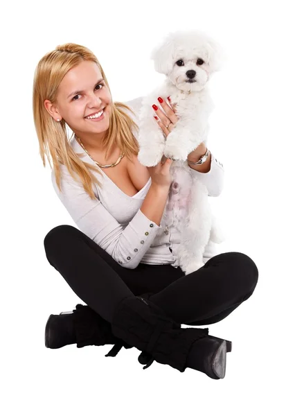 Szczęśliwa dziewczyna i biały pies — Zdjęcie stockowe