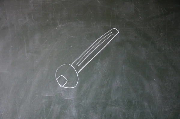 Key drawn with chalk on blackboard — Stock Photo, Image