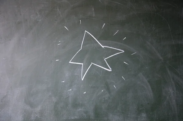 Star drawn with chalk on blackboard — Stock Photo, Image