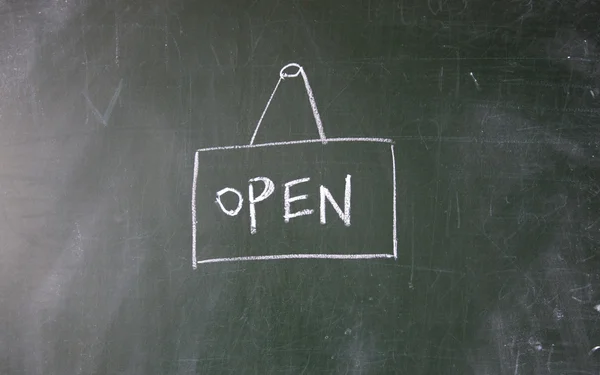 Open sign drawn with chalk on blackboard — Stock Photo, Image