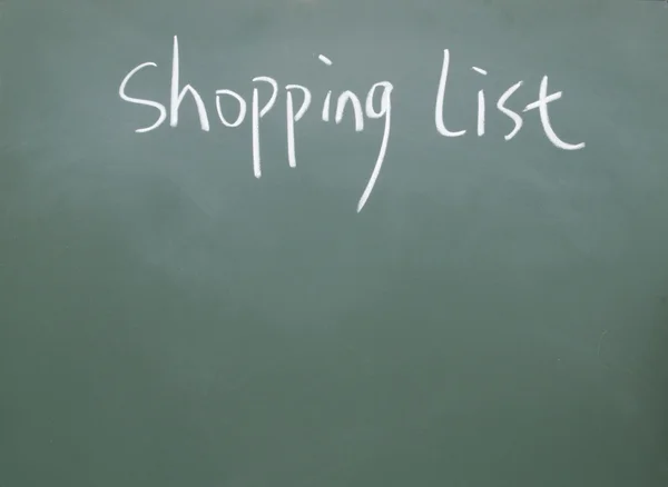 Shopping lista titel skriven med krita på svarta tavlan — Stockfoto
