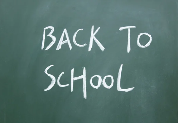 Back to school title written with chalk on blackboard — Stock Photo, Image