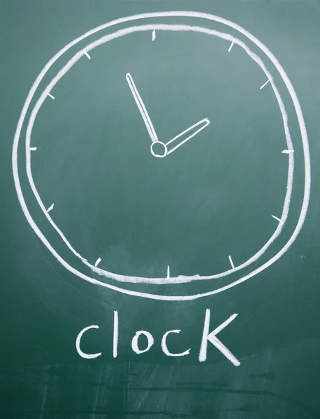 Clock drawn with chalk on blackboard — Stock Photo, Image