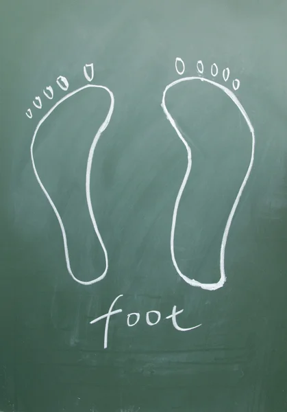 Fuß mit Kreide auf Tafel gezeichnet — Stockfoto