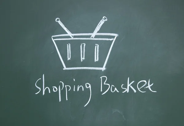Shopping basket drawn with chalk on blackboard — Stock Photo, Image