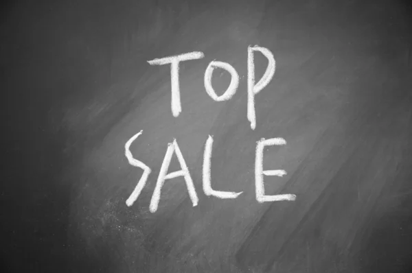 Titul nejvyšší prodej napsaný křídou na tabuli — Stock fotografie