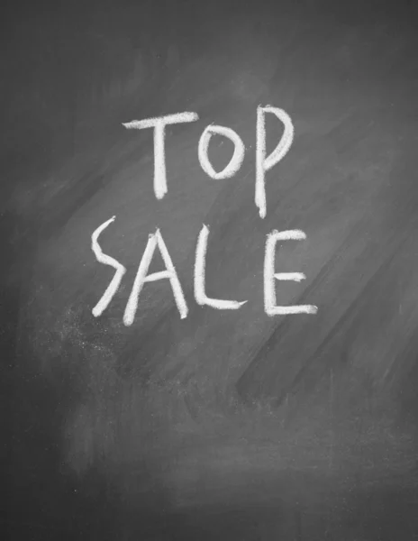 Titul nejvyšší prodej napsaný křídou na tabuli — Stock fotografie