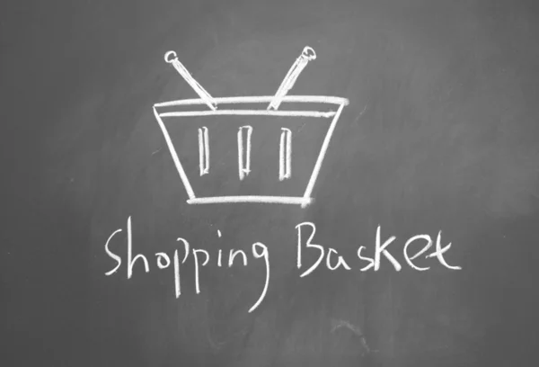 Shopping basket drawn with chalk on blackboard — Stock Photo, Image