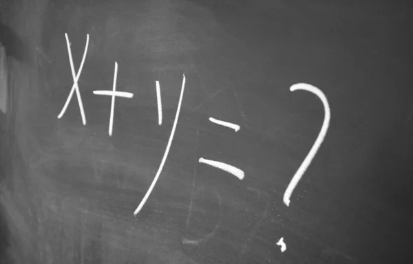 X+y=? written with chalk on blackboard — Stock Photo, Image