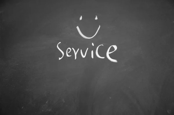 Service title written with chalk on blackboard — Stock Photo, Image