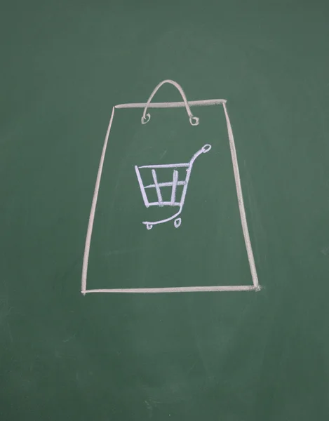 Shopping bag drawn with chalk on blackboard — Stock Photo, Image