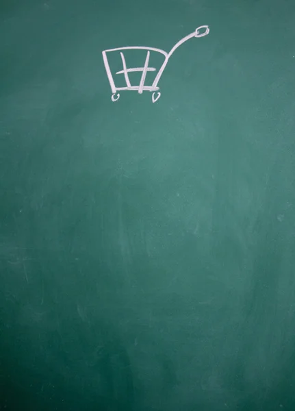 Shopping cart symbol drawn with chalk on blackboard — Stock Photo, Image