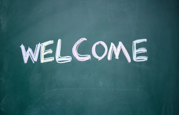 Welcome title written with chalk on blackboard — Stock Photo, Image