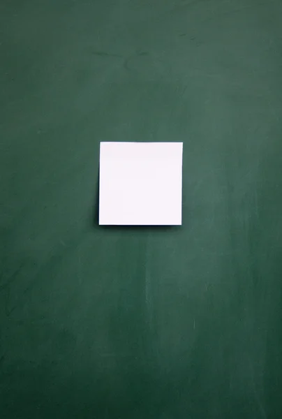 Note and blackboard — Stock Photo, Image