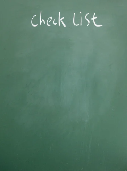 Check list title written with chalk on blackboard — Stock Photo, Image