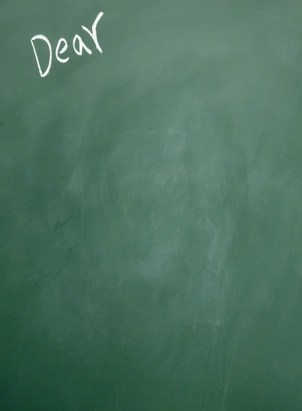 Dear title written with chalk on blackboard — Stock Photo, Image