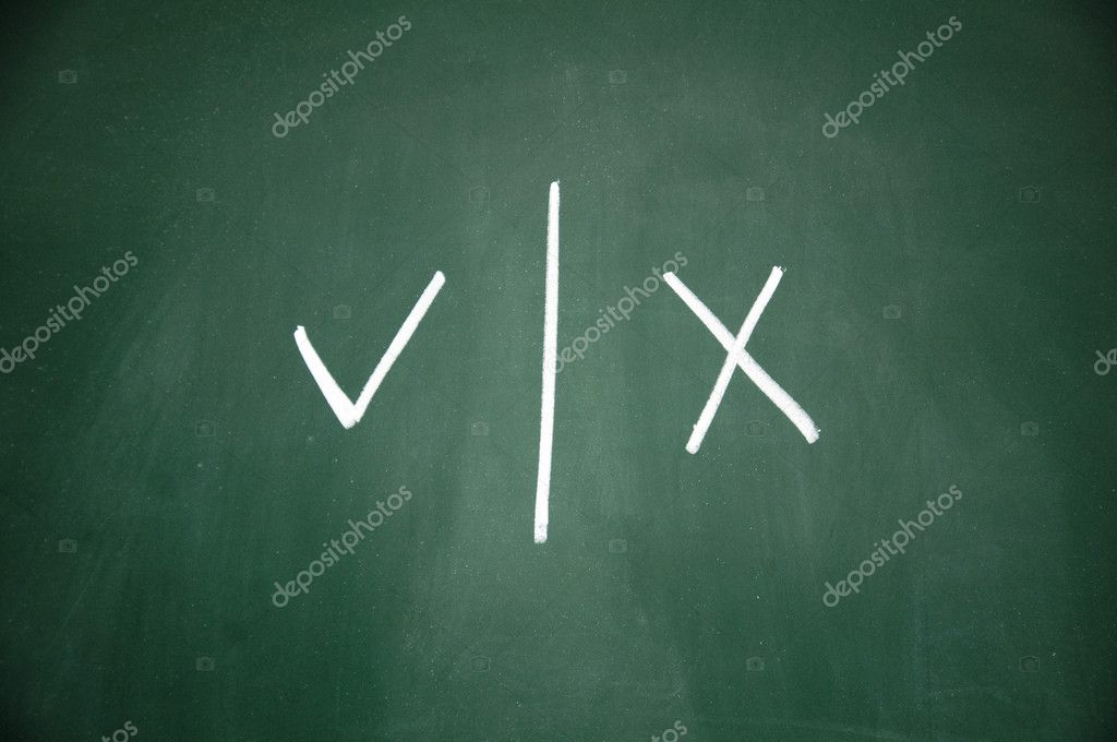 Right and wrong symbol written with chalk on blackboard — Stock Photo