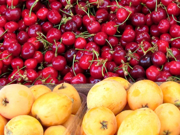 Stock image Tel Aviv shesek and cherry fruit 2012