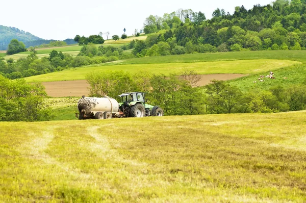 Tractor with dung — Stock Photo, Image
