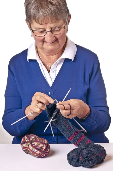 Pensioner knitting soxs — Stock Photo, Image