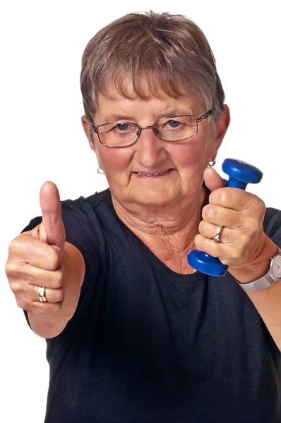 Pensioner with muscle training — Stock Photo, Image