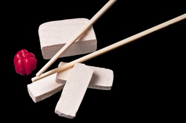 Tofu with chop-sticks clipart