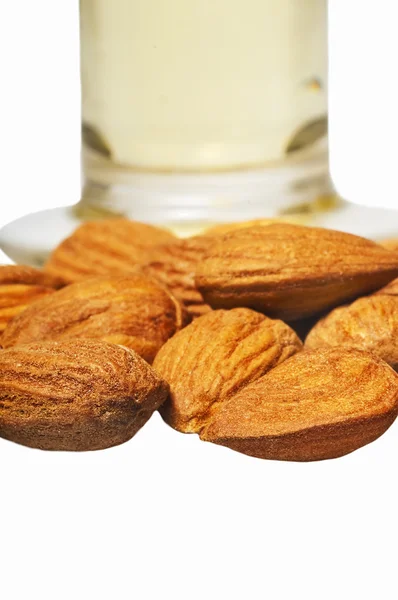 Almonds with almond oil — Stock Photo, Image