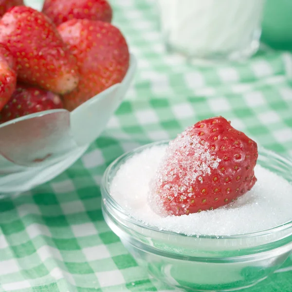 Strawberries in a glass bowl — Stock Photo, Image