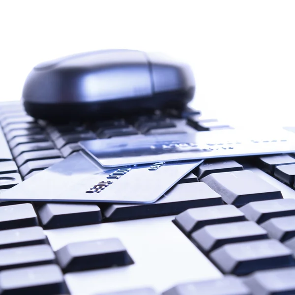 Credit cards on the keyboard — Stock Photo, Image