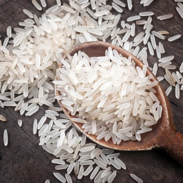 Rijst in lepel — Stockfoto