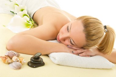 Beautiful woman on spa massage clipart