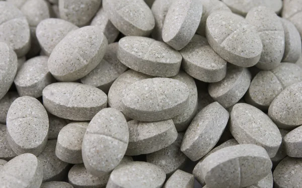 Bakgrund med vita piller — Stockfoto