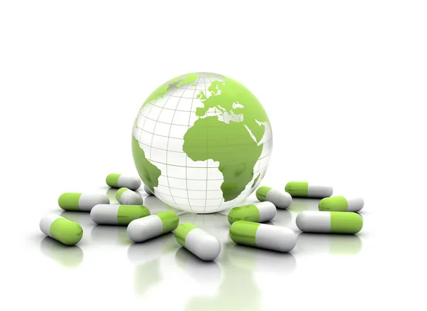 Medikamentenpillen und Weltkugel — Stockfoto