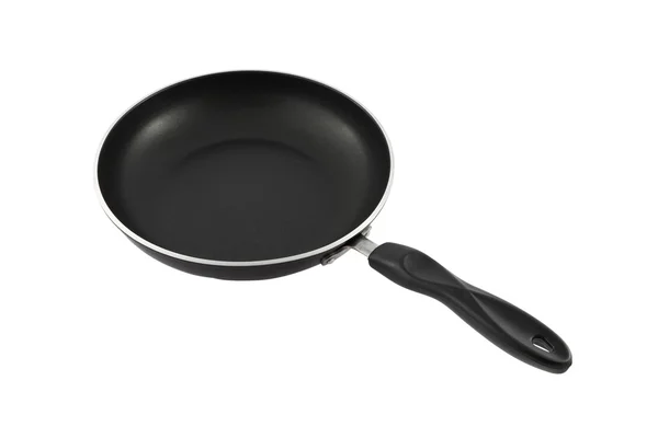 Черная сковорода с ручки — стоковое фото